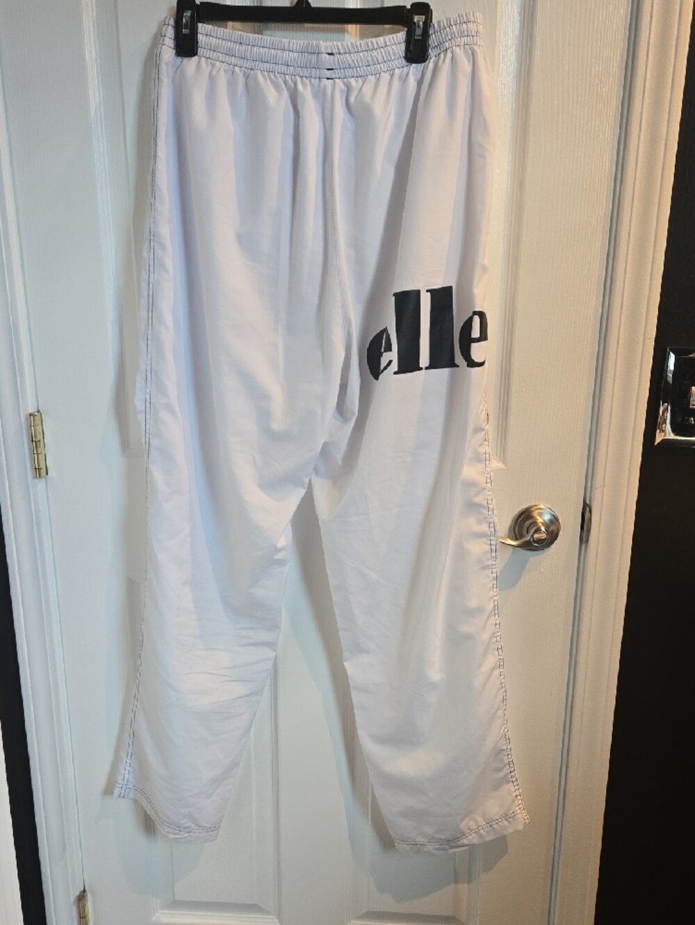 Ellesse White Track Pants with Black Logo Stripes - Picture 3 of 3